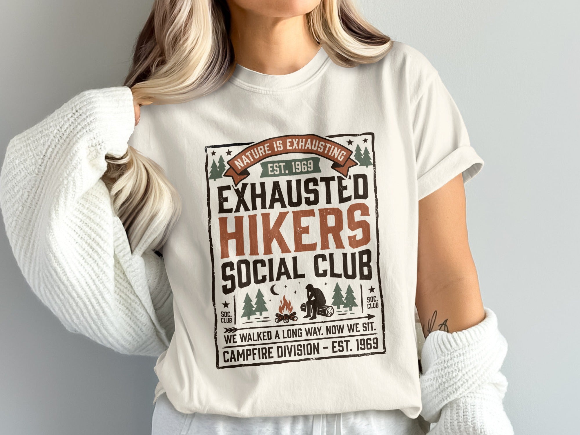 T-shirt with "Exhausted Hikers Social Club" text and campfire graphic.