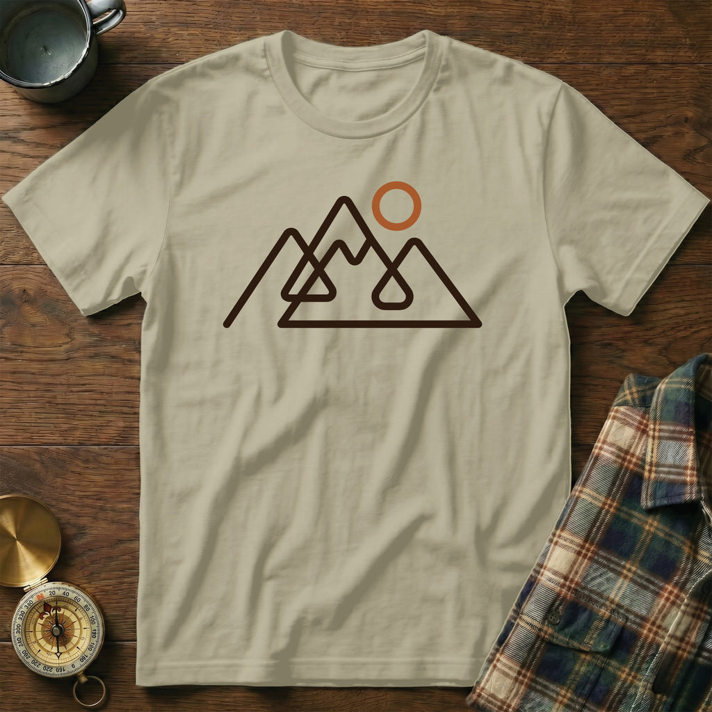 Light brown t-shirt with minimalist mountain and sun graphic.