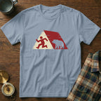 Light blue t-shirt with graphic of running person and bear inside a red and white triangle.