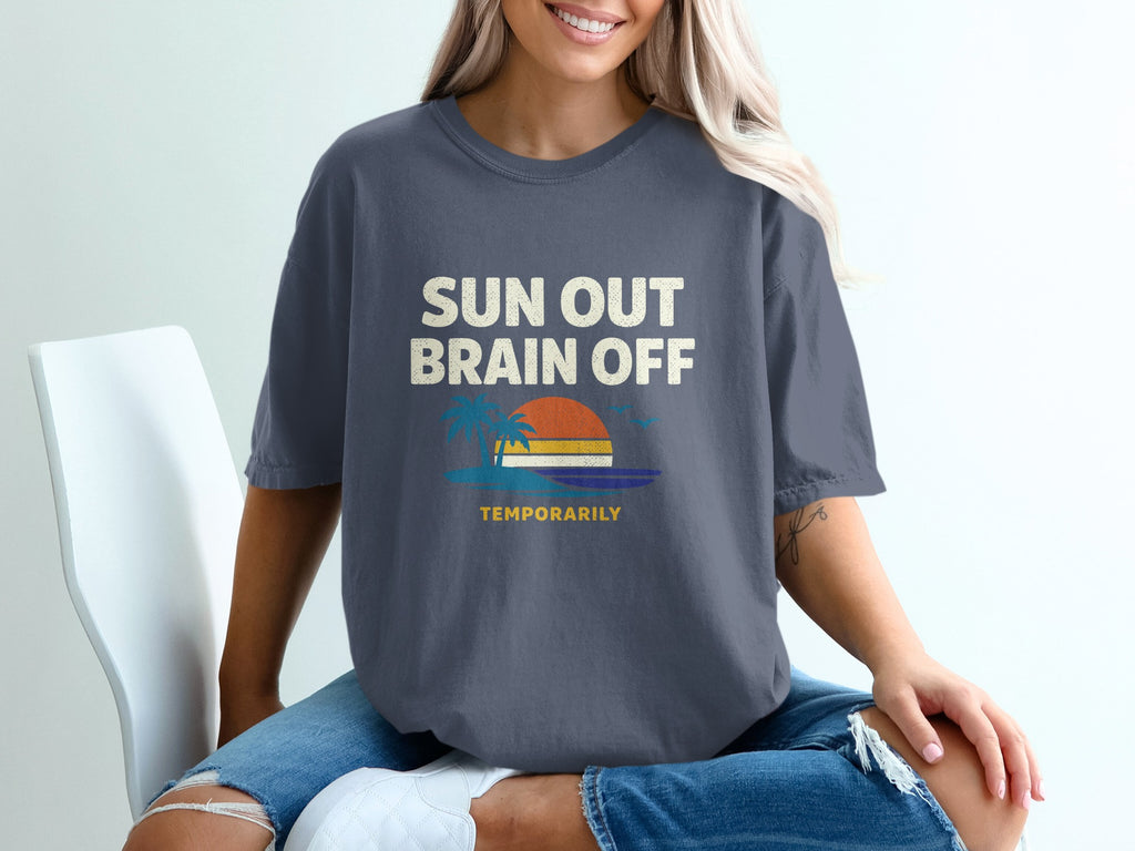 Gray t-shirt with "Sun Out, Brain Off" text and sunset graphic.
