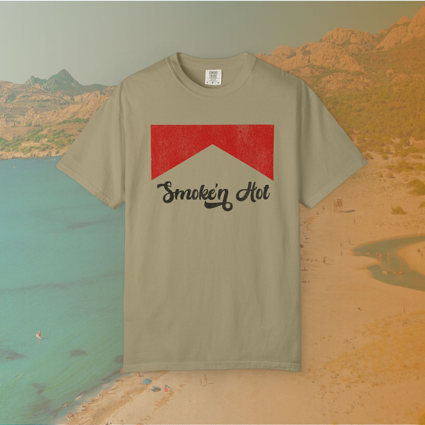 khaki Graphic T-shirt featuring a distressed red chevron shape with the black script text "Smokin' Hot" centered below it, in a vintage style.