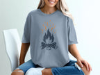 Gray t-shirt with orange campfire graphic and distressed texture.