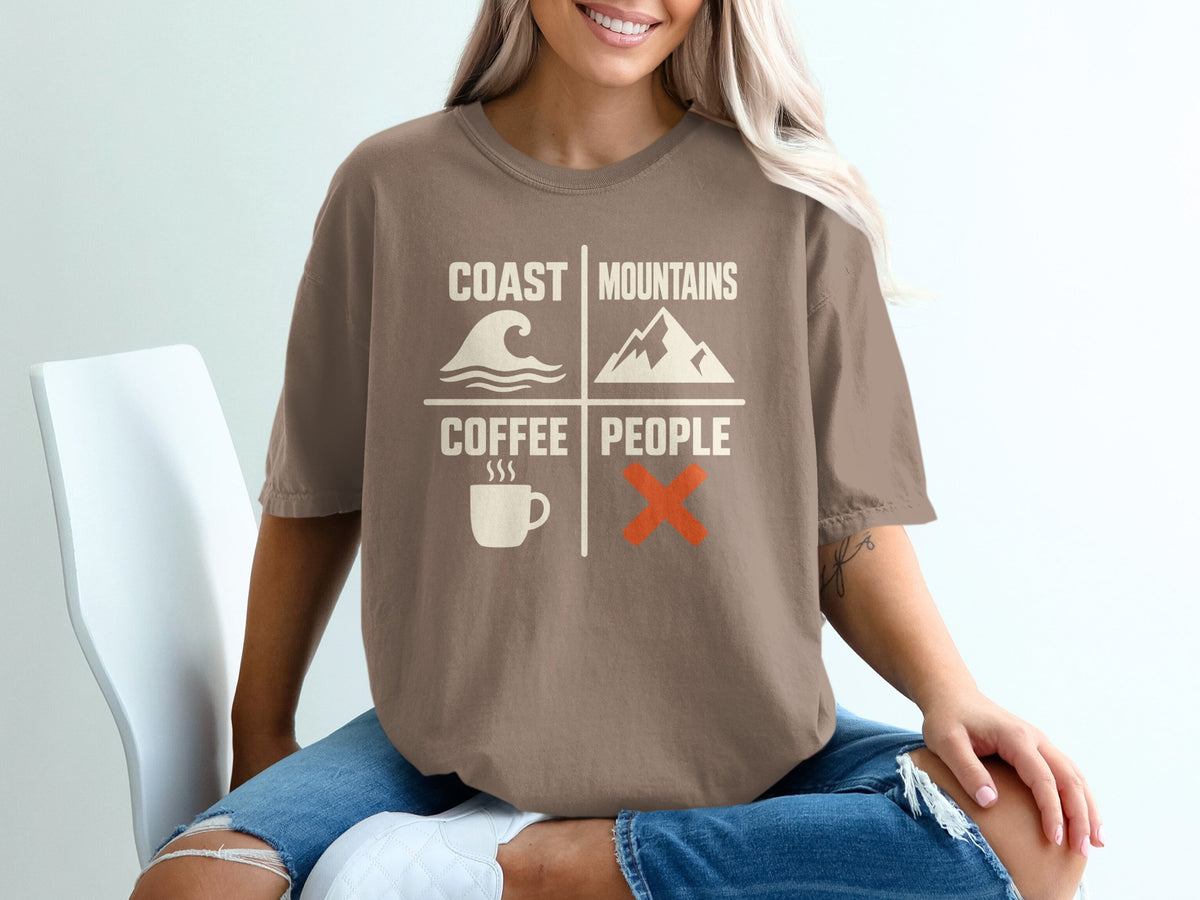Brown t-shirt with "Coast Mountains Coffee People" graphic and icons.