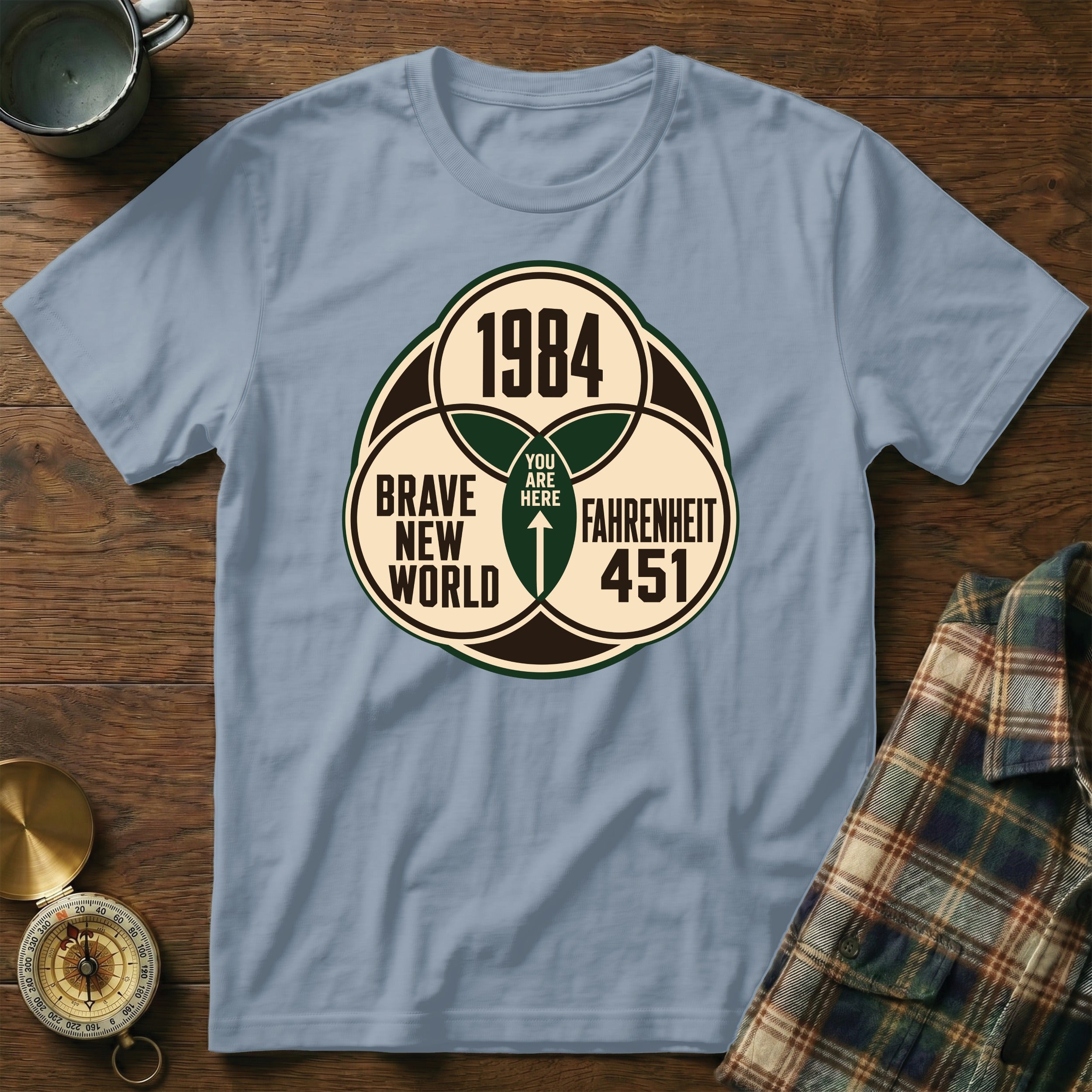 Light blue t-shirt with "1984", "Brave New World", and "Fahrenheit 451" text.