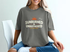 Gray t-shirt with "Sunburned & Unbothered" and birds graphic.