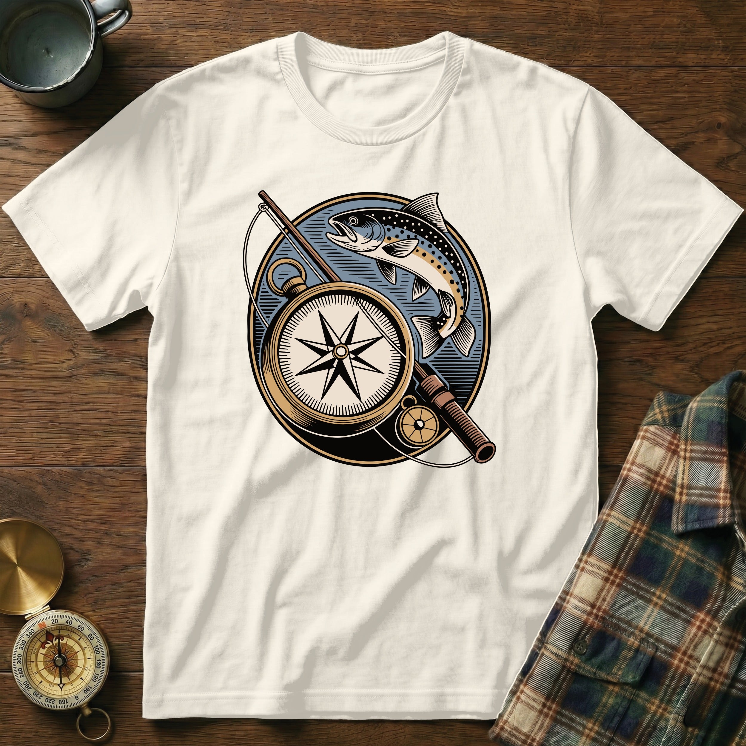T-shirt graphic of a trout, fishing rod, and compass rose.