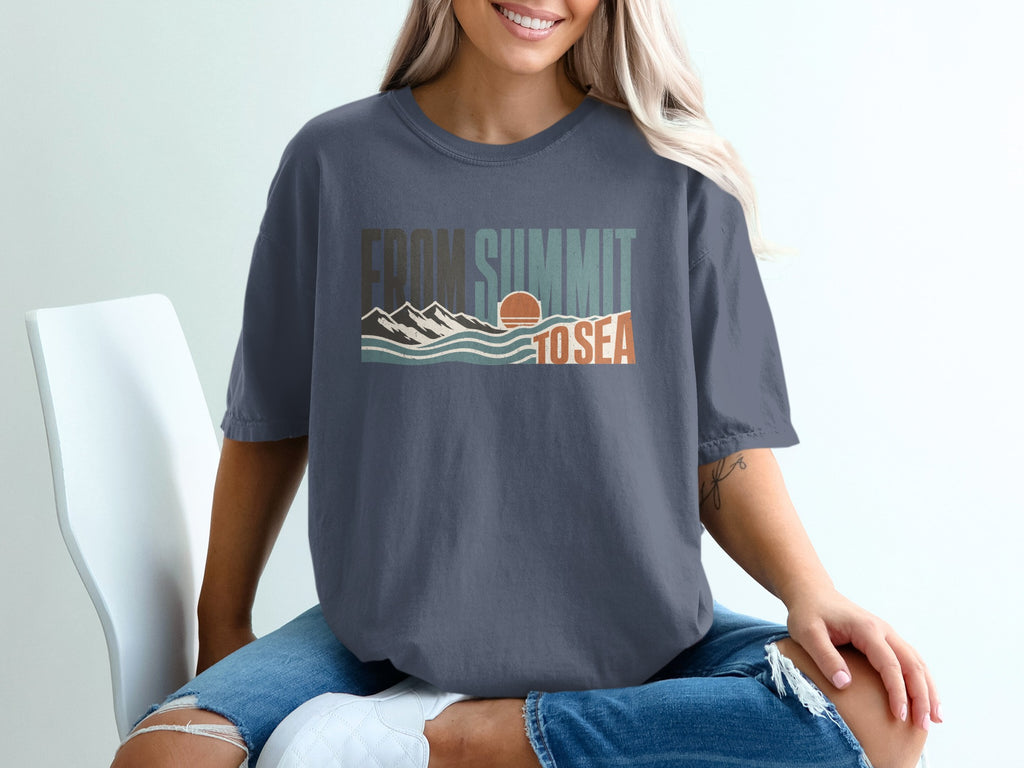 T-shirt with graphic text "From Summit to Sea" and mountain-ocean scene.