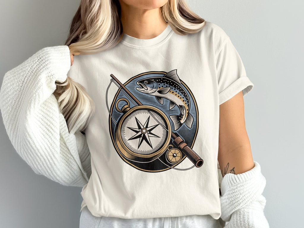 T-shirt with vintage compass, fishing rod, and leaping trout design.