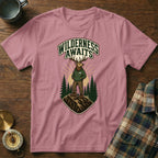 Pink t-shirt with illustration of elk above "Wilderness Awaits" text.