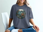 Graphic t-shirt with circular ocean scene featuring starfish and coral.