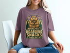 Woodchuck holding acorns with text "Hoarding Snacks Since Birth."