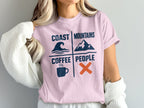 Pink t-shirt with "Coast Mountains Coffee People" and corresponding icons.