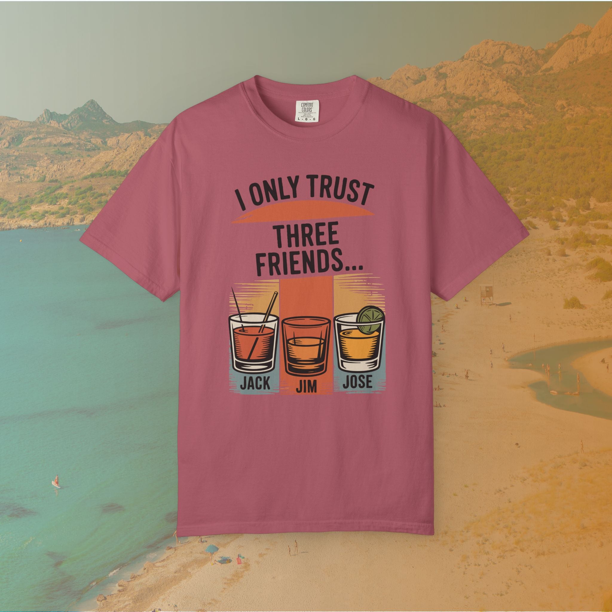 pink t-shirt Graphic T-shirt featuring three illustrated drinks on retro color panels labeled "JACK," "JIM," and "JOSE." The text above reads: "I ONLY TRUST THREE FRIENDS"