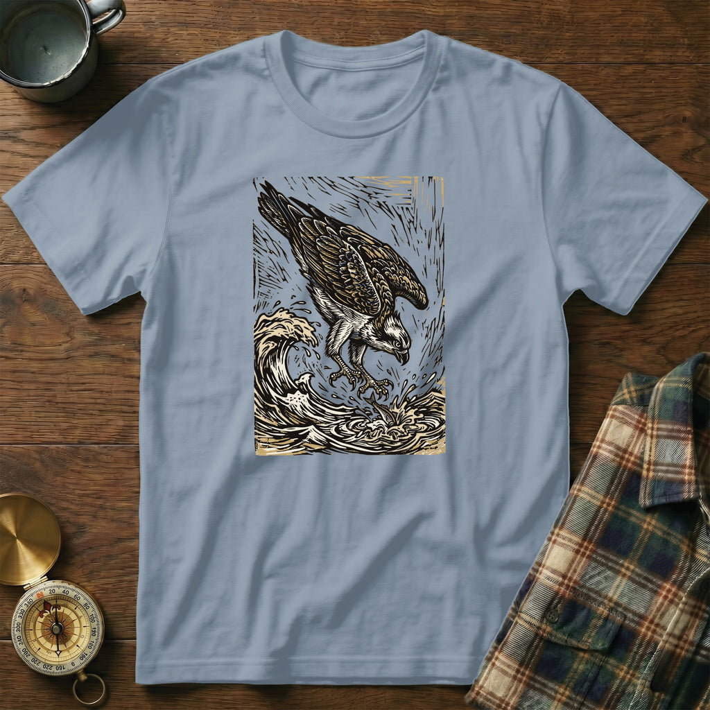 Light blue t-shirt featuring a woodcut illustration of an osprey diving into waves.