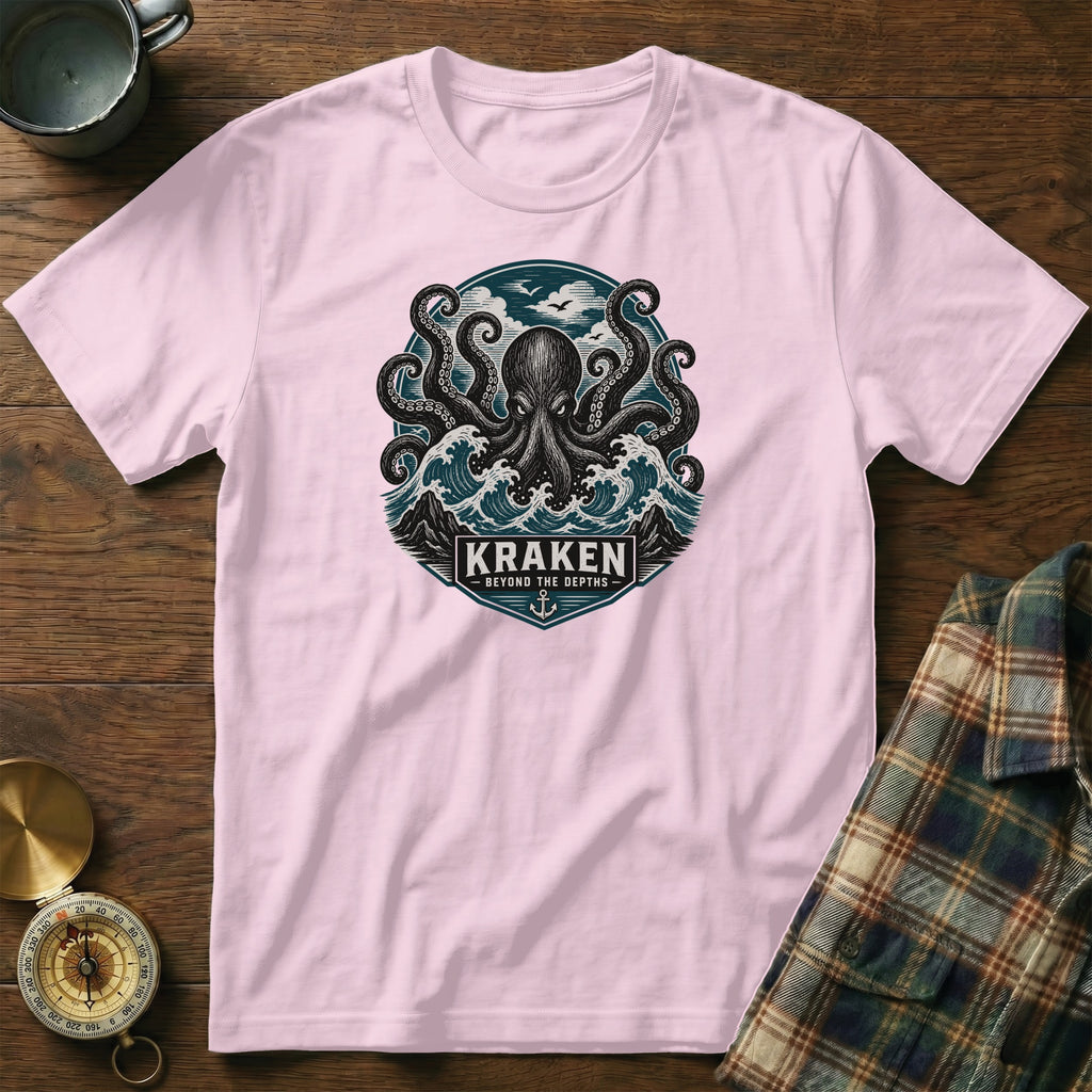 Pink t-shirt with Kraken octopus graphic featuring waves and text "KRAKEN BEYOND THE DEPTHS".