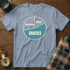 Light blue t-shirt with a pie chart graphic indicating "Snacks," "Miles," and "Complaining."