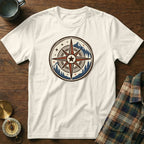 White t-shirt with a circular compass graphic featuring mountains and pine trees.