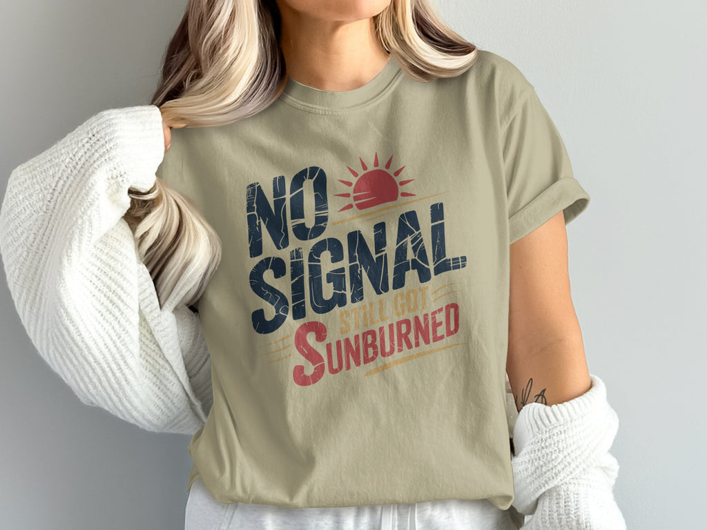 T-shirt with text "NO SIGNAL STILL GOT SUNBURNED" and a small sun graphic.