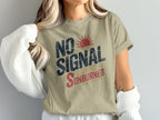 T-shirt with text "NO SIGNAL STILL GOT SUNBURNED" and a small sun graphic.