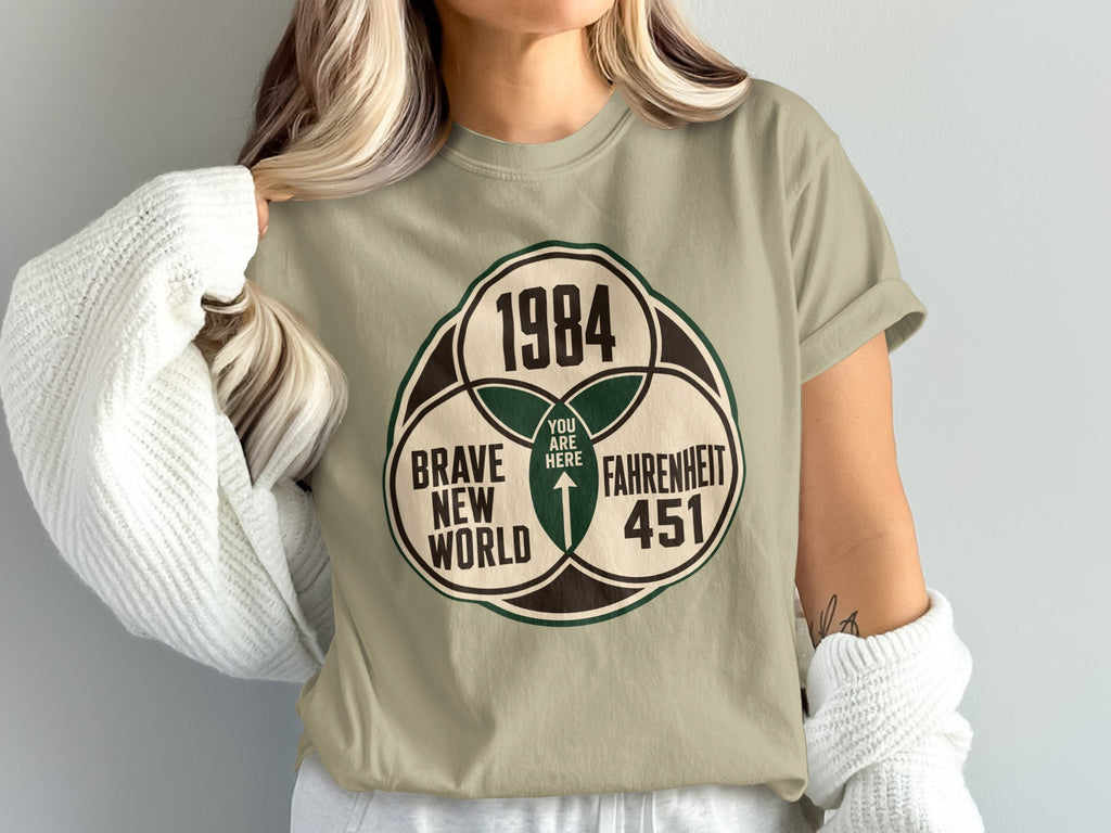 T-shirt graphic with "1984", "Brave New World", and "Fahrenheit 451" and "You Are Here".