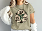 T-shirt graphic with "1984", "Brave New World", and "Fahrenheit 451" and "You Are Here".
