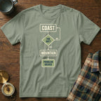 Green t-shirt with flowchart: Coast, Too Hot?, Yes, Mountain, Problem Solved.