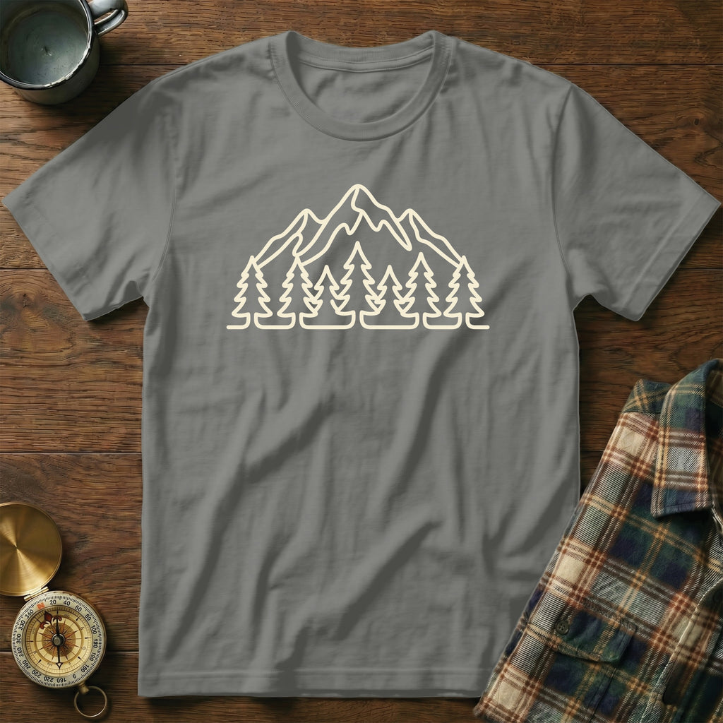 Grey t-shirt with a minimalist mountain and pine tree outline graphic.