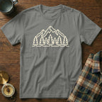 Grey t-shirt with a minimalist mountain and pine tree outline graphic.
