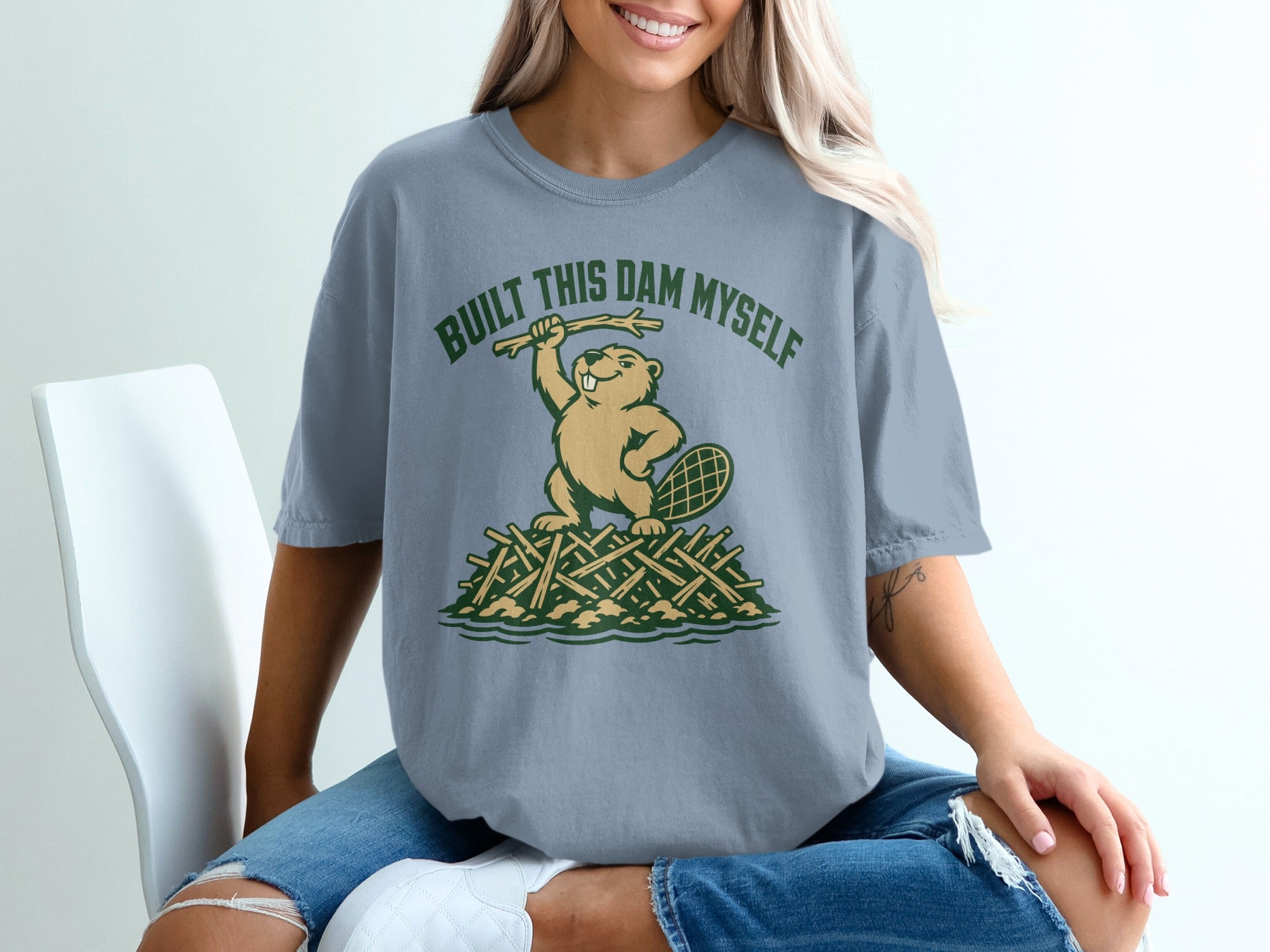 Beaver on dam construction, text "BUILT THIS DAM MYSELF"