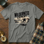 T-shirt with "WILDERNESS EXPERT" text and a beach chair.