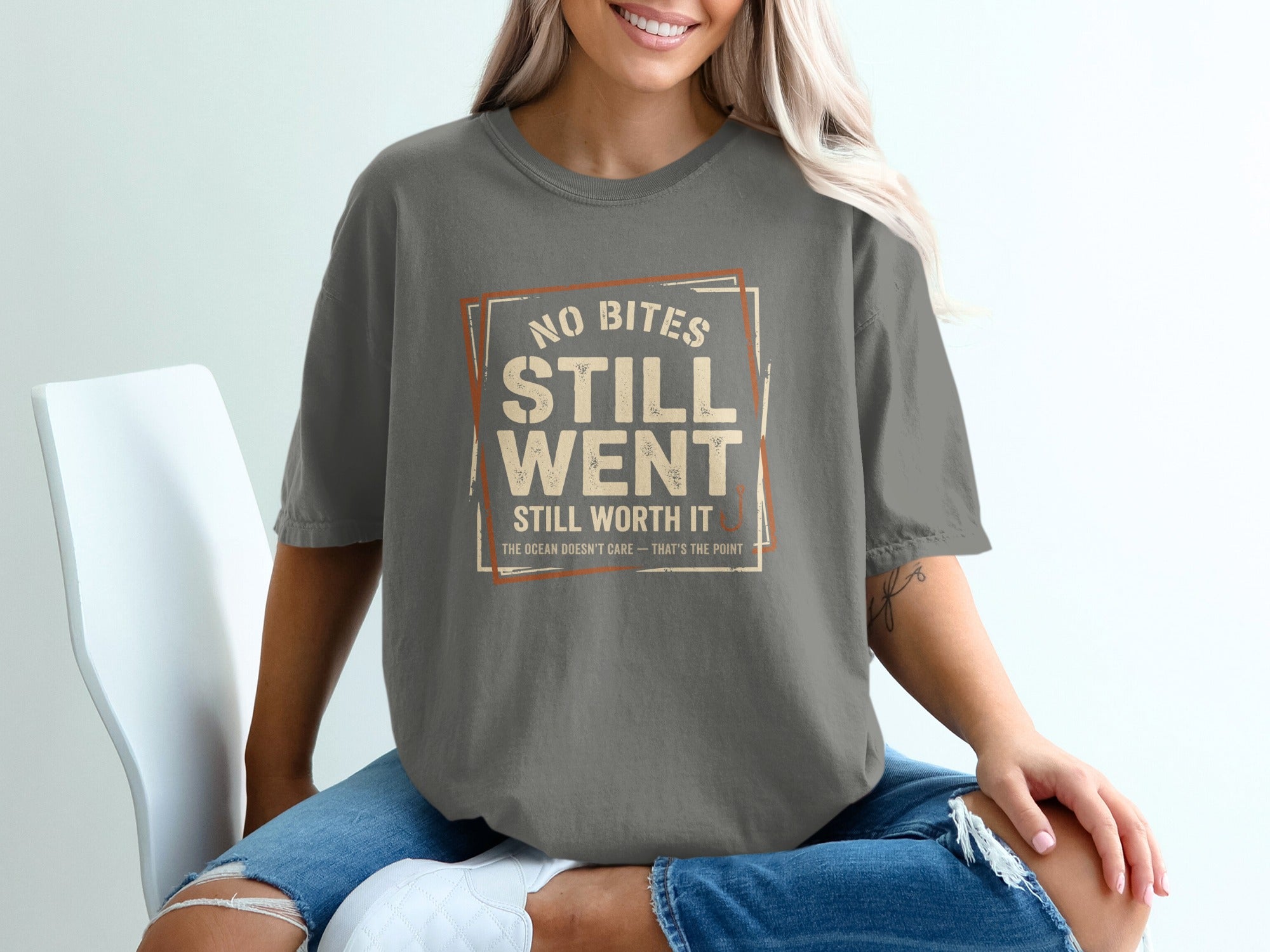 Grey t-shirt with "No Bites Still Went Still Worth It" text.