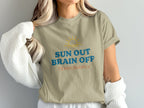 T-shirt with text "SUN OUT BRAIN OFF TEMPORARILY" and a sun graphic.