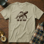 T-shirt with a turtle graphic and "ON MY WAY" text.