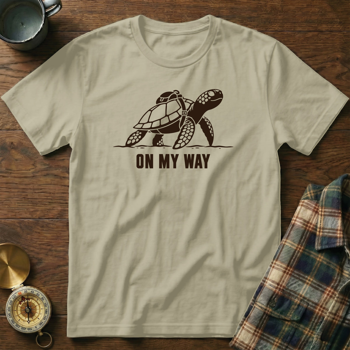 T-shirt with a turtle graphic and "ON MY WAY" text.