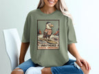 Graphic of eagle surfing with text "UNBOTHERED COASTAL AMERICANA".