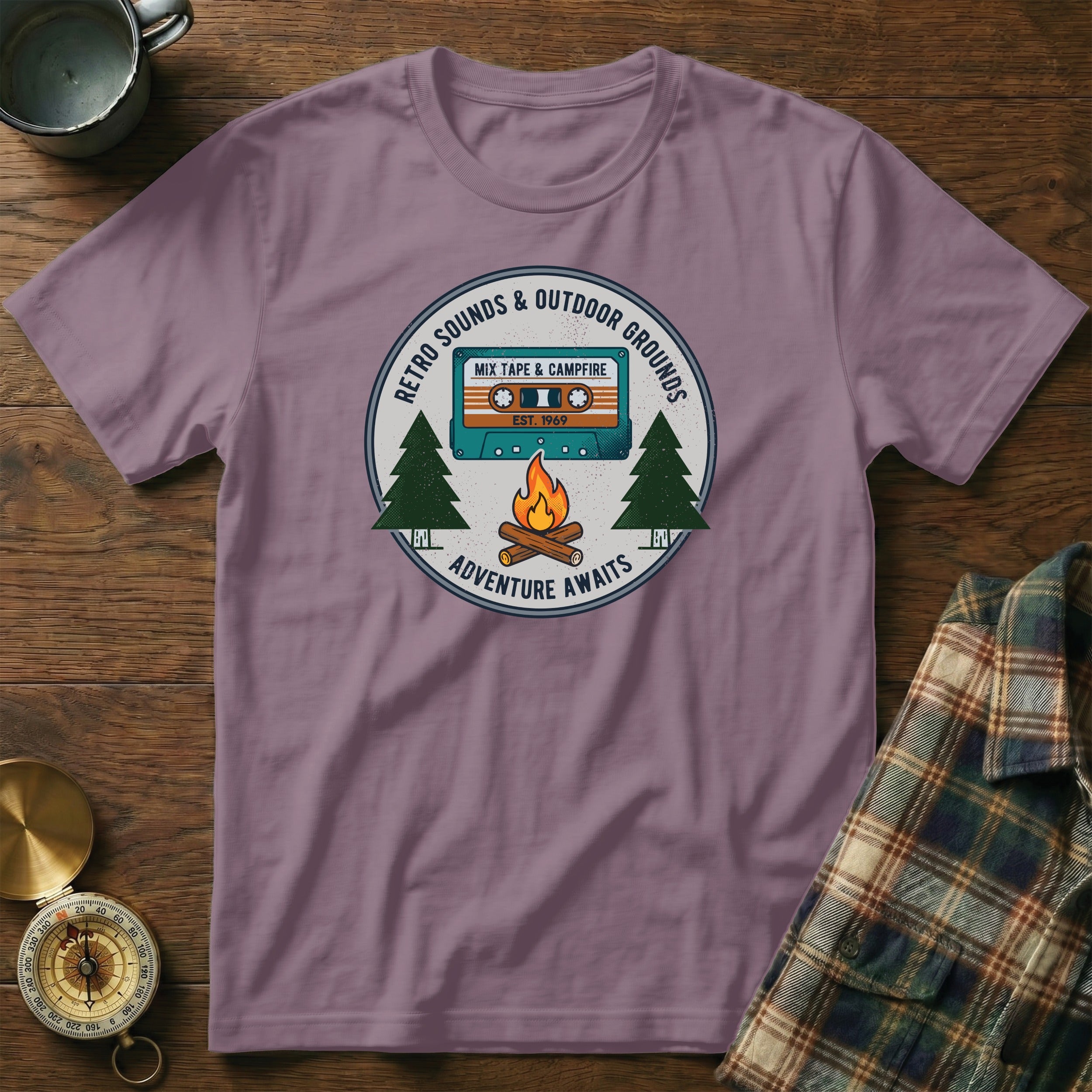 T-shirt with retro cassette tape, campfire, and pine trees graphic.