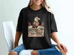 Eagle wearing sweater and hat surfing with text "UNBOTHERED COASTAL AMERICANA."