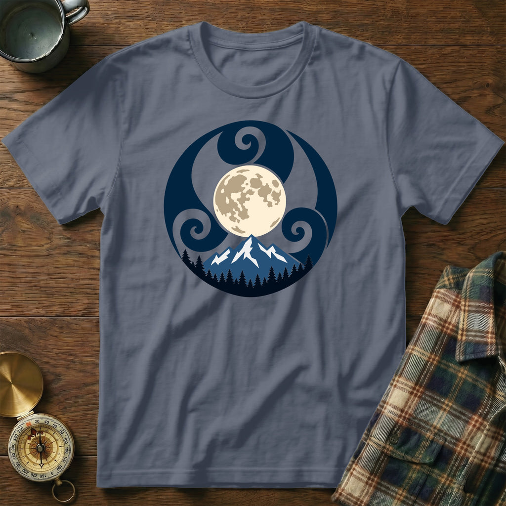 T-shirt with a circular design featuring a moon over mountains and trees.