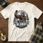 Bigfoot taking a selfie in the mountains with text "WHO'S BLURRY NOW?".
