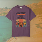 purple t-shirt Graphic T-shirt featuring three illustrated drinks on retro color panels labeled "JACK," "JIM," and "JOSE." The text above reads: "I ONLY TRUST THREE FRIENDS"