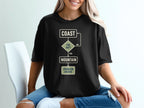 Black t-shirt with a flowchart: Coast, Too hot? Yes, Mountain, Problem Solved.