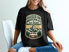 Black t-shirt with "Raised On Mountain Air & AM Radio" mountain and van graphic.