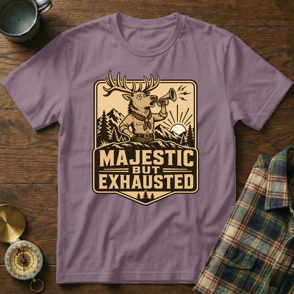 Purple t-shirt features a deer blowing a horn with text "MAJESTIC BUT EXHAUSTED".