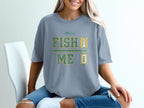 T-shirt with "FISH 1 ME 0" text and fish skeleton graphic.