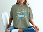 Green t-shirt with pie chart graphic: "Complaining," "Miles," and "Snacks."