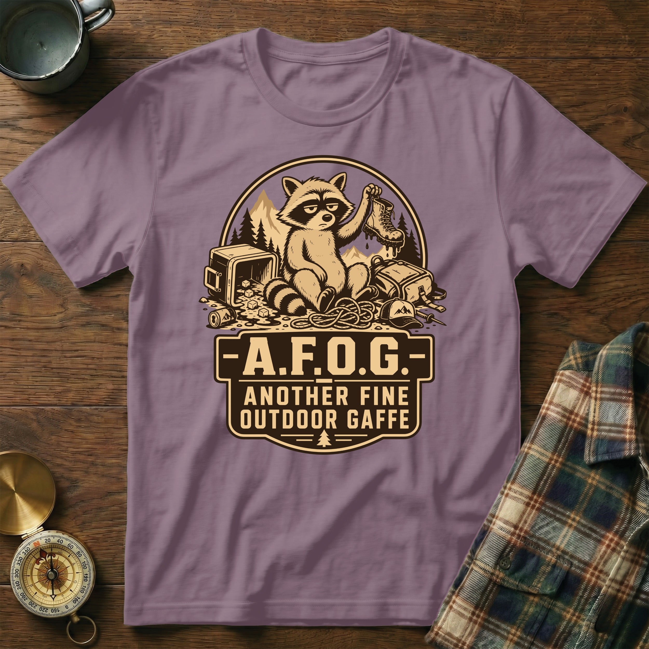 T-shirt with raccoon graphic and text "A.F.O.G. Another Fine Outdoor Gaffe".