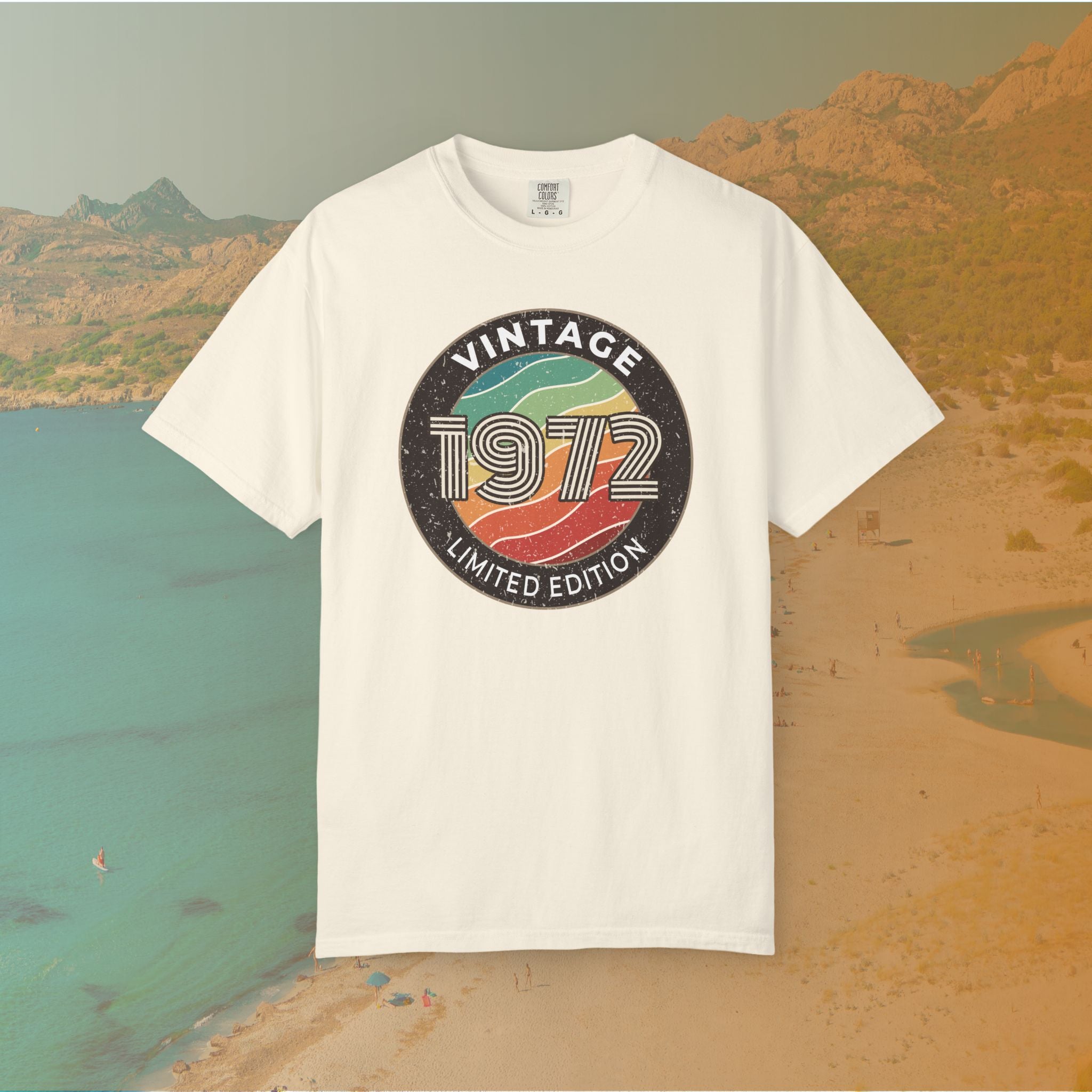 White t-shirt with 'Vintage 1972 Limited Edition' design on a scenic background