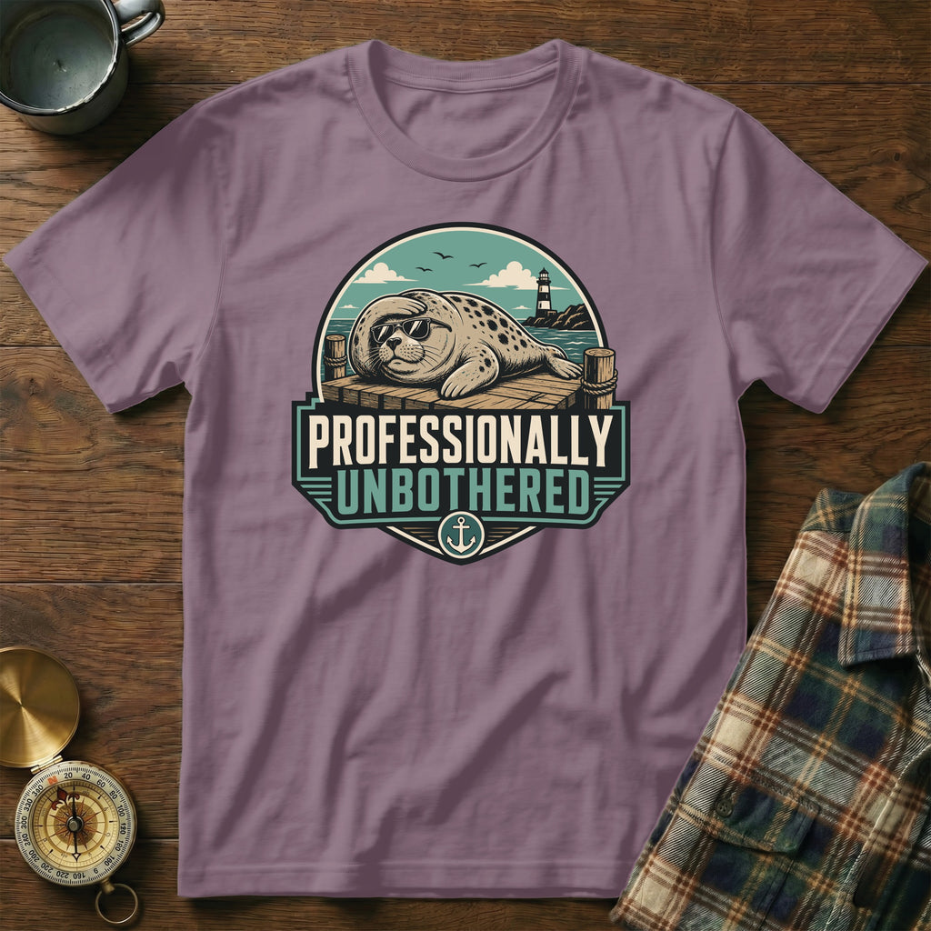 Purple t-shirt with a seal wearing sunglasses and text "Professionally Unbothered".