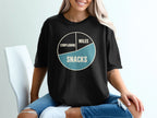 Black t-shirt with a pie chart graphic labeled "Complaining," "Miles," and "Snacks."