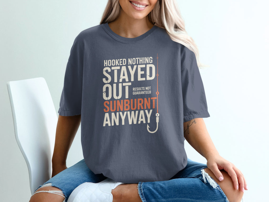 Dark gray t-shirt with "Hooked Nothing Stayed Out Sunburnt Anyway" text and fishing hook.